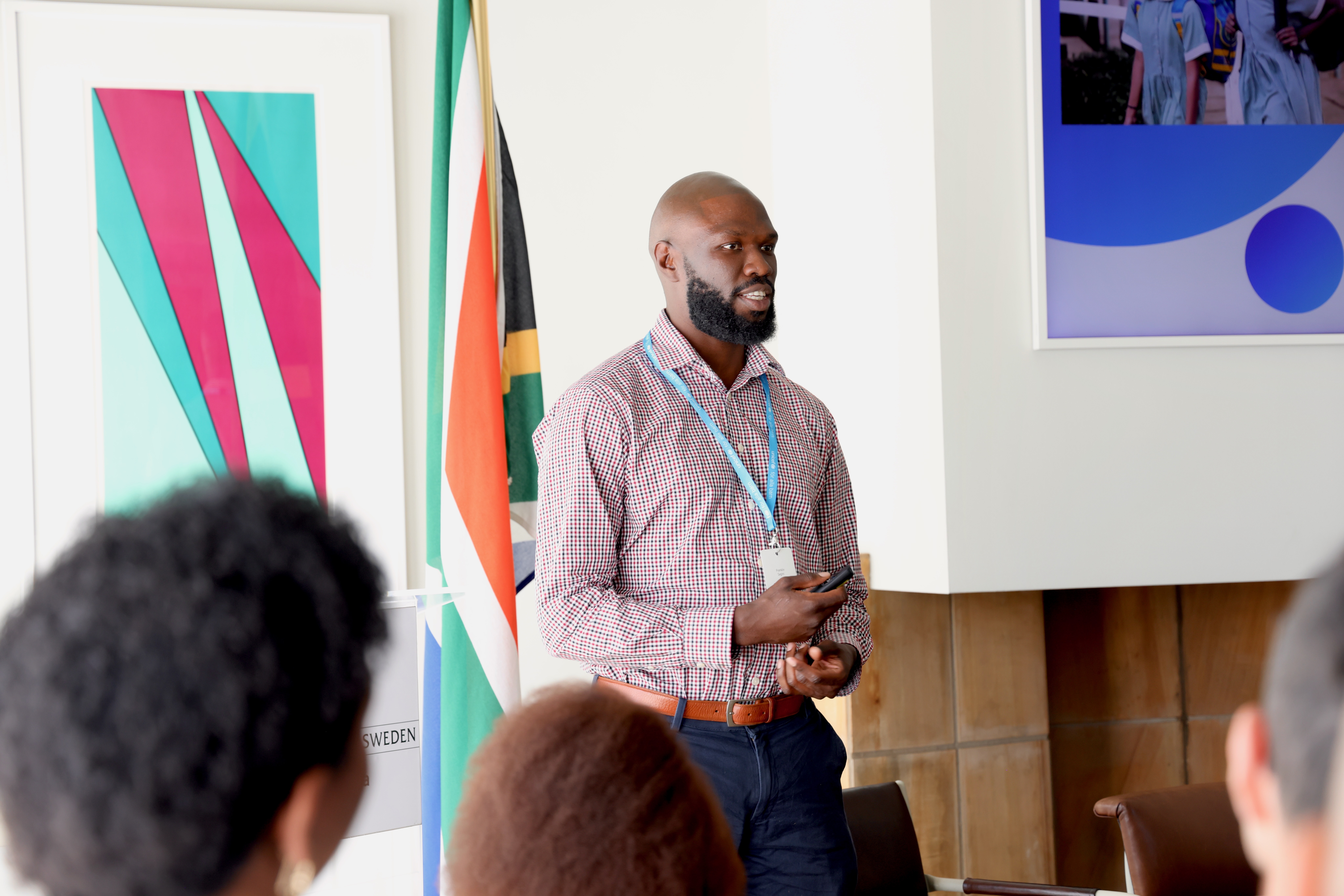 SafeRide CEO speaking with attendees during a UNICEF Venture Fund presentation