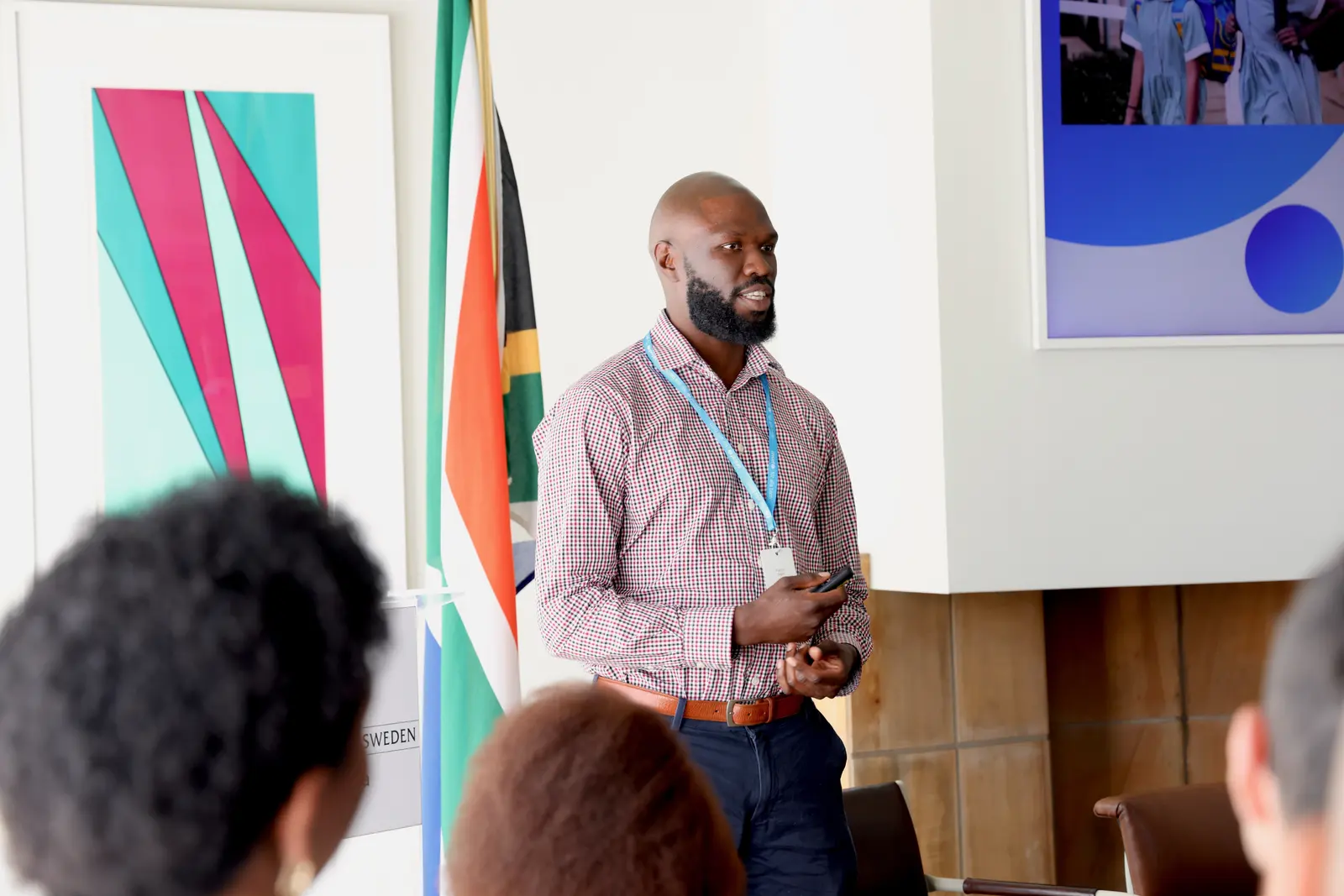 SafeRide CEO speaking with attendees during a UNICEF Venture Fund presentation